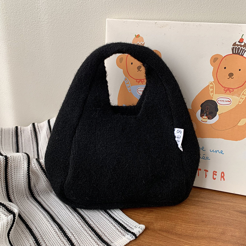 Nuevo otoño y invierno con bolso de lana, bolso de lana de mujer, estilo coreano de alta calidad, simple y versátil bolso de viaje de color sólido.