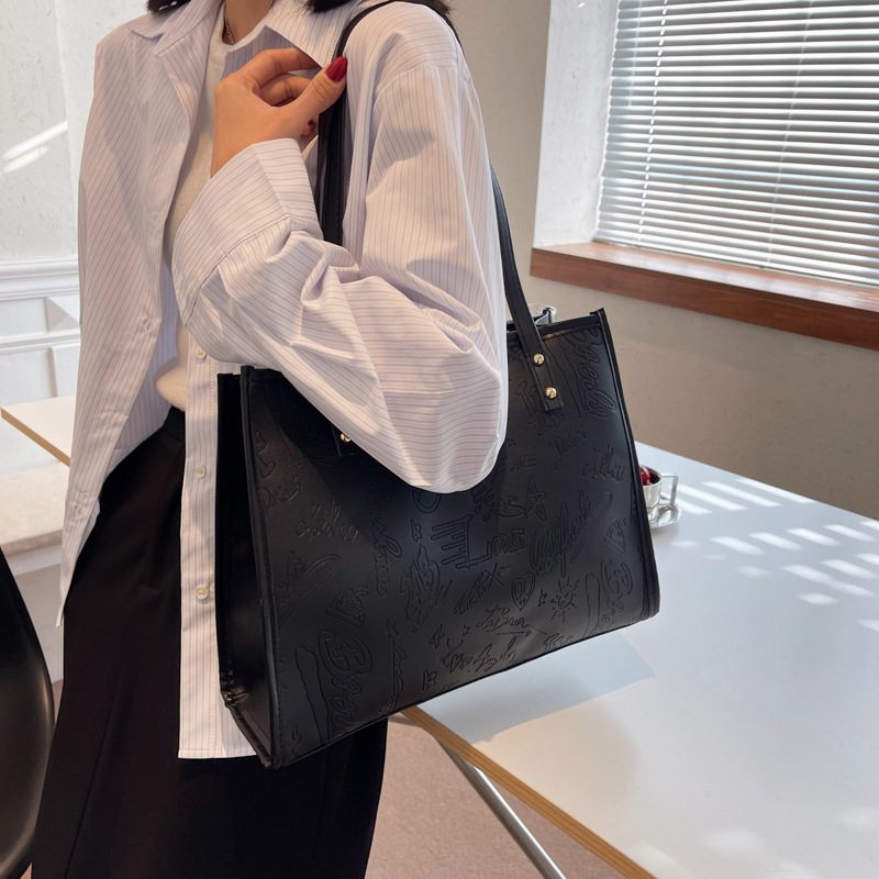 Bolso de mujer 2024 primavera nuevo nicho lienzo de cuatro hojas de gran capacidad bolso de hombro simple bolso de todo tipo