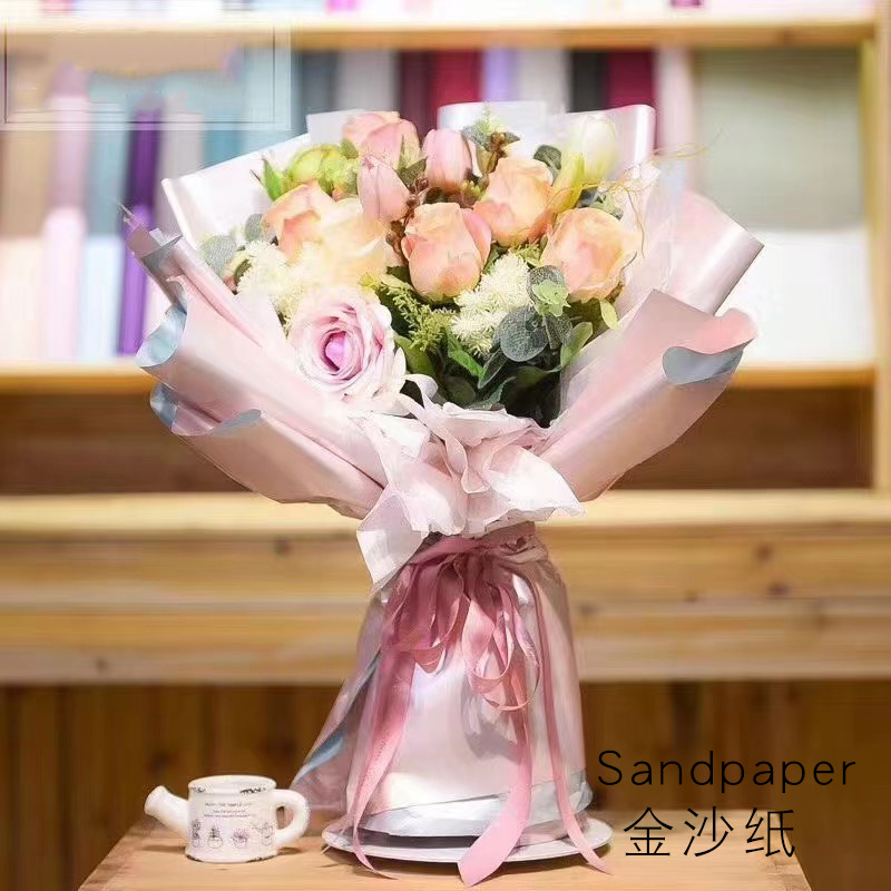 Huaxi papel de arena de oro flor papel de embalaje de papel mate de dos colores al por mayor ramo de regalo de papel de embalaje de materiales de viento fragante