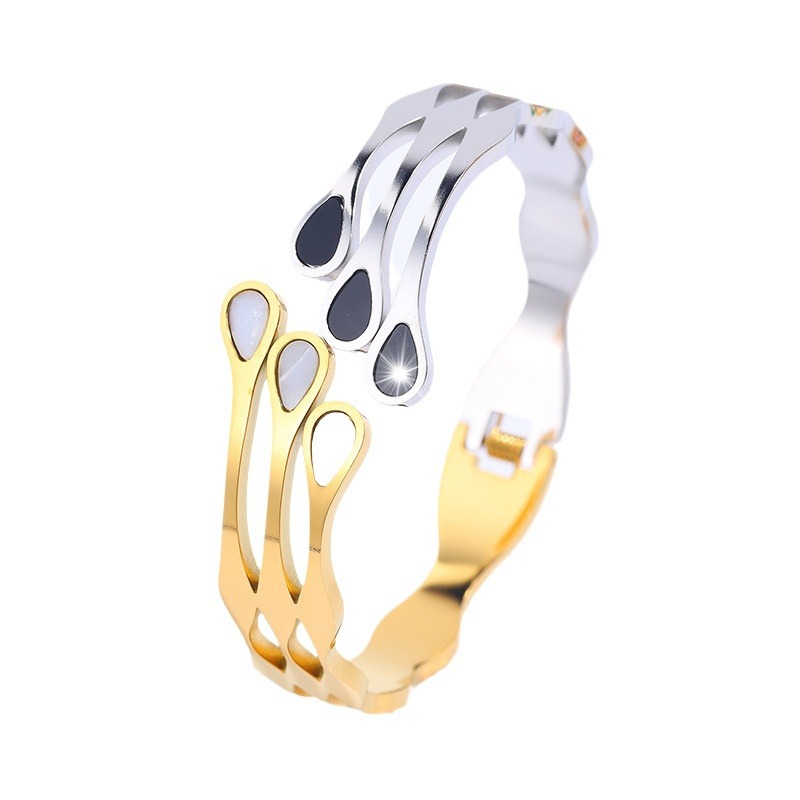 Europa y los Estados Unidos de moda hipster 18k oro blanco y negro pulsera de conchas de mujer versión coreana simple amiga pulsera de acero de titanio venta directa