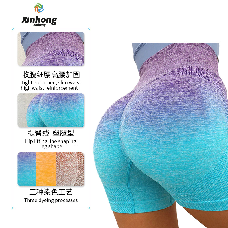 Pantalones cortos de yoga sin costuras teñidos con gradiente transfronterizo europeo y americano transpirables de las mujeres de secado rápido Melocotón Cadera apretada cintura alta estiramiento tres puntos