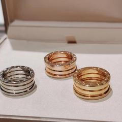 Baojia 高バージョン 925 シルバー小さな赤い人形セラミックリング CNC 精密厚いメッキスプリングダイヤモンドライト高級カップルリング