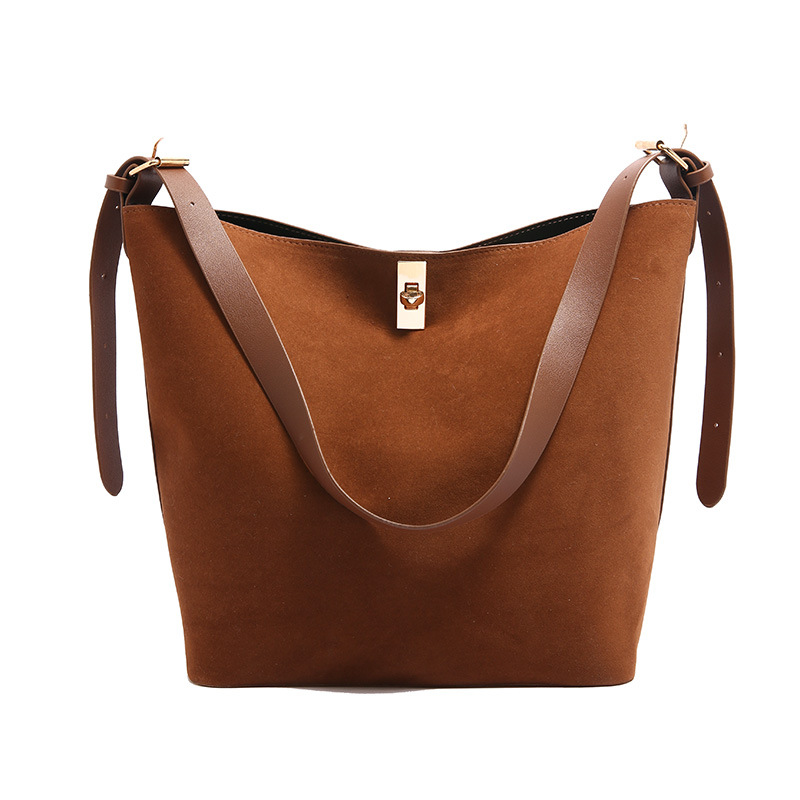 2024 invierno nueva moda de gran capacidad de viaje bolsa de viaje bolsa de moda extranjera simple bolsa de cubo simple bolsa de hombro