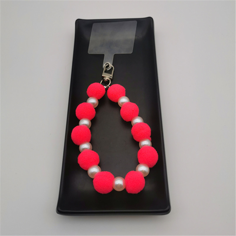 Nueva Bola de piel de cadena de perlas colgante Cadena de teléfono móvil ins Internet celebridad mismo estilo muñeca de invierno pulsera peluda cadena portátil