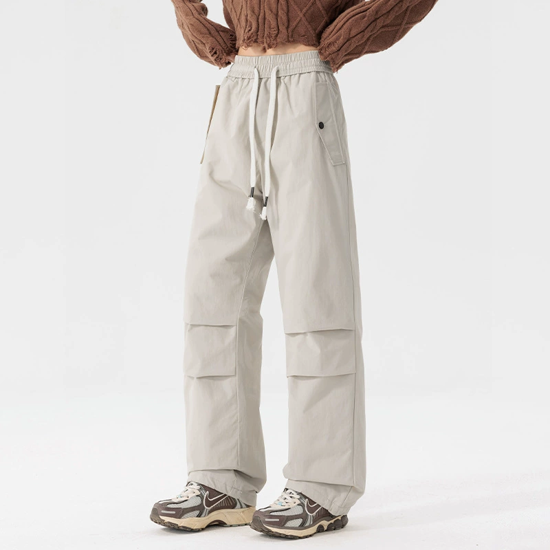 Трансграничные пуховые штаны мужского графена нагреваются и утолщены, чтобы согреться