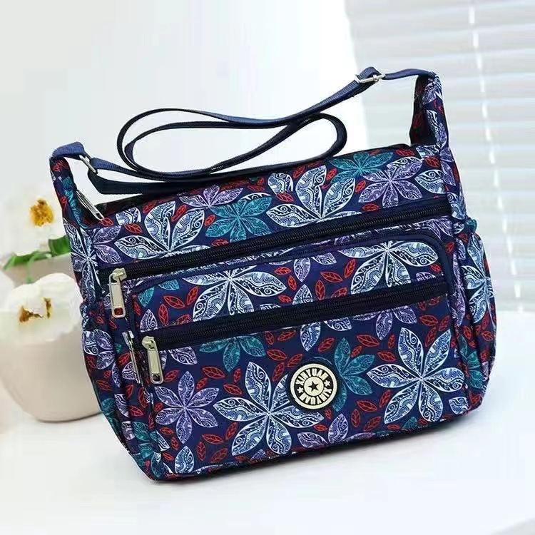 Bolsa de tela de flores bolsa de mensajero de las mujeres nueva bolsa de Madre de gran capacidad bolsa de hombro individual de mediana edad y ancianos bolsa de tela Oxford bolsa