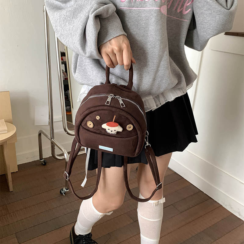 Caricatura lindo muñeca mochila de niña 2025 nueva moda mini mochila de comercio exterior transfronterizo mochila esmerizada mujer