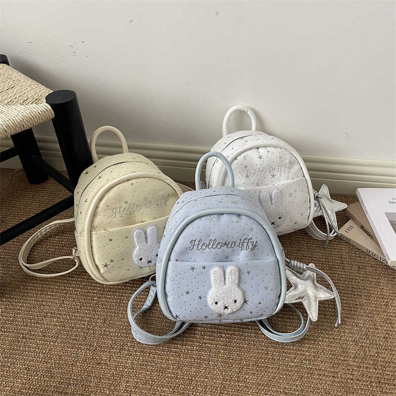 Nicho colegio estilo mochila portátil mujer 2026 nueva moda simple dibujos animados versátil viaje ocio mochila de moda