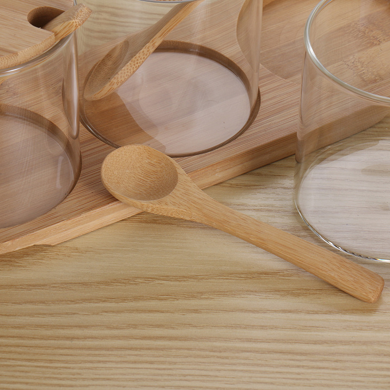 Botella de condimento de vidrio con tapa Cuchara de madera traje de almacenamiento de cocina botella de vidrio transparente base de bambú condimento frasco de acabado