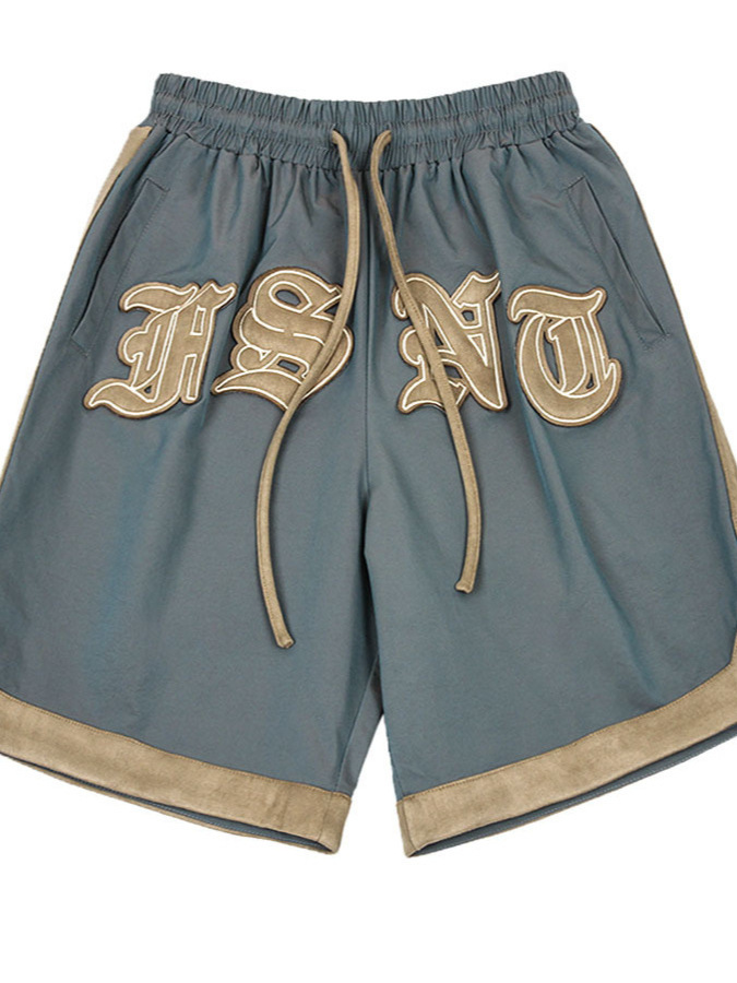 Marca de moda callejera europea y americana 2024 primavera y verano nuevo producto ligero camaleón contraste color bordado moda deportes casual pantalones cortos hombres