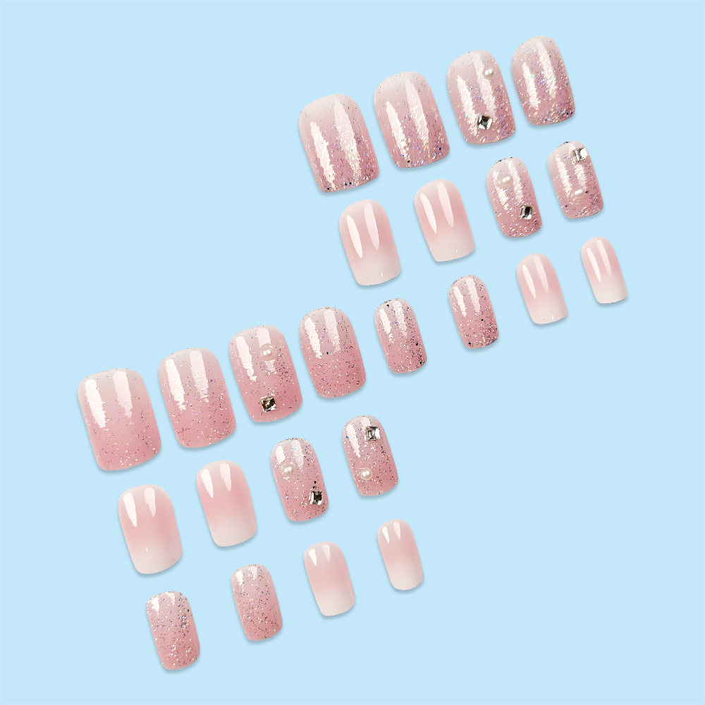 Las piezas de uñas deslumbrantes más vendidas en Europa y América, el temperamento de las chicas calientes es blanco, el cielo estrellado, las piezas de uñas de diamantes brillantes