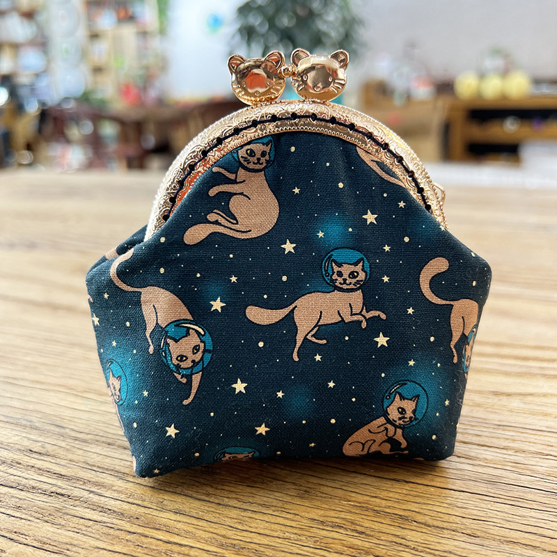 Bolsa de material de bordado bricolaje hecho a mano 8,5 boca Bolsa de Oro patchwork bolsa antigua bolsa transfronteriza inglés gato bolsa de almacenamiento