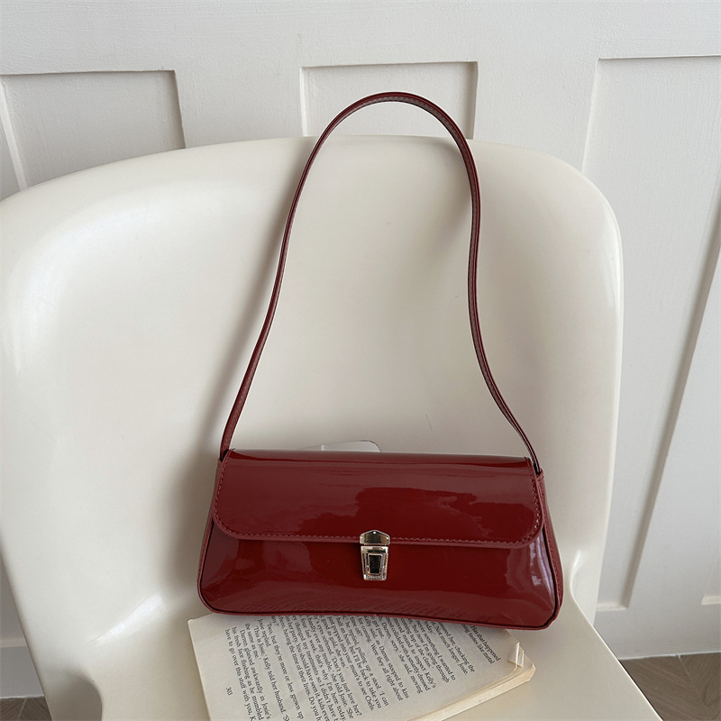 Borsa a tracolla da donna in stile francese con texture a nicchia, nuova collezione estate 2026, stile retrò, elegante e lucida, da portare sotto l'ascella._voghion.com