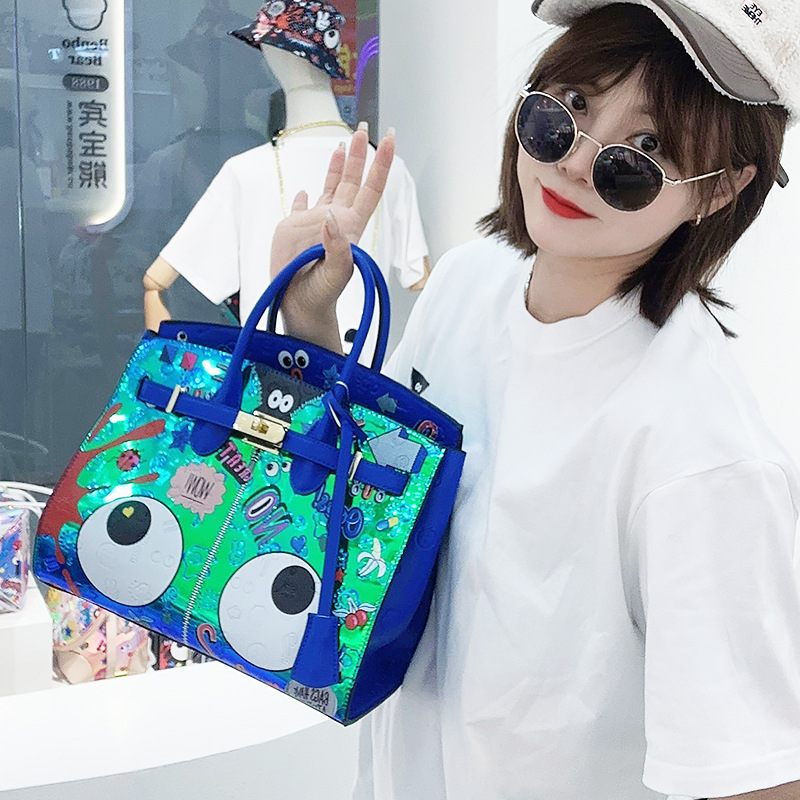 2025 verano fantasía de color metal material especial impresión insignia personalidad bolso de mujer bolso de mano 2486 #