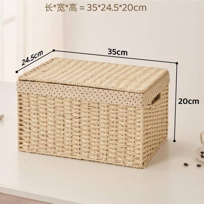 収納かごは草編みのデスクトップの間食収納かごの家庭用編みをまねて、籐編みのおもちゃ収納ケースを制定することができます。