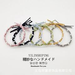 小清新お下げの髪輪は手作りで真珠の髪紐を編みます。