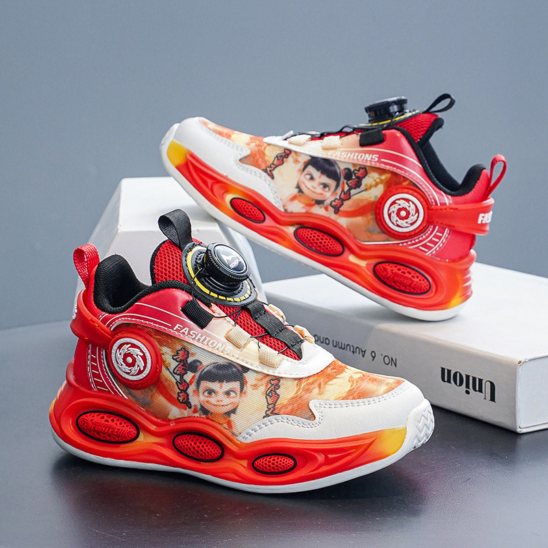 Nezha zapatos de baloncesto primavera y otoño 2025 nuevos zapatos de niños mallas transpirables botones giratorios zapatos antideslizantes