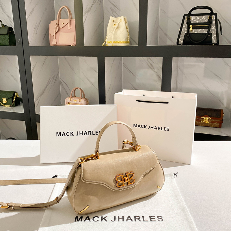 Una bolsa de silla de lujo ligera de nicho 2024 nueva bolsa de mano retro de alta calidad al por mayor