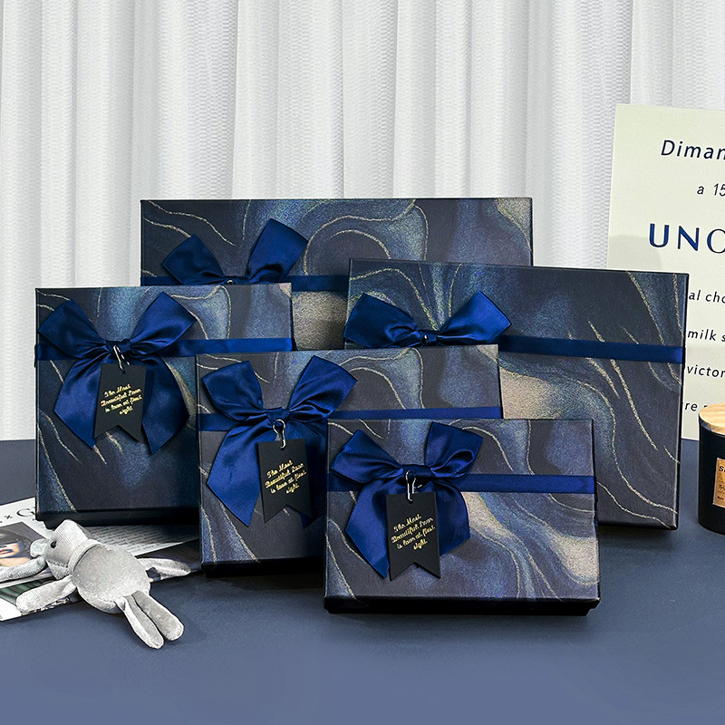 2025 nueva caja de regalo de arco de alto nivel de sensación de cubierta de embalaje bufandas caja de regalo de cumpleaños fabricantes al por mayor