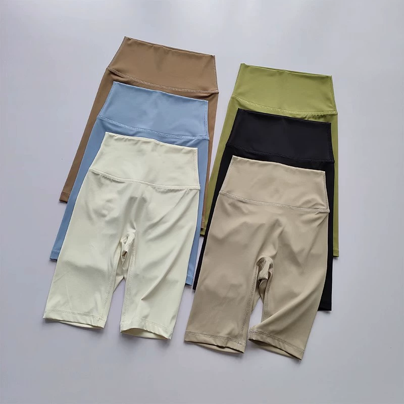 Обнаженные штаны для йоги с пятью очками Женская спортивная одежда с высокой талией