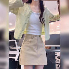 多巴胺绿色镂空针织开衫防晒罩衫女2025新款早春季小众设计感上衣