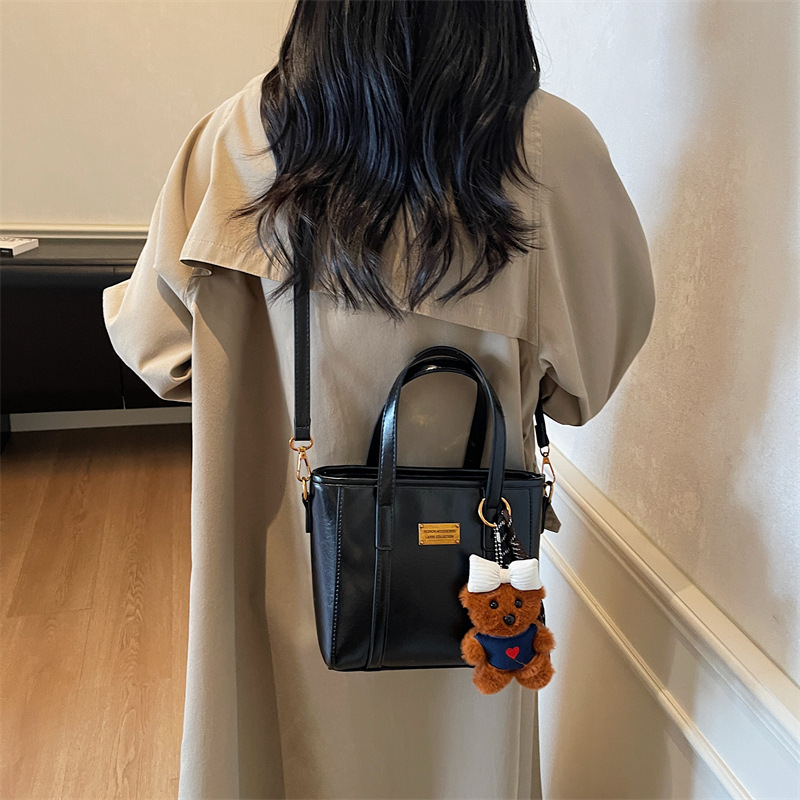 Bolso de mano retro de alto nivel, bolso de balde de agua universal, mujer, otoño y invierno 2025, nuevo tipo de bolso de hombro de moda, bolso de transporte de viaje