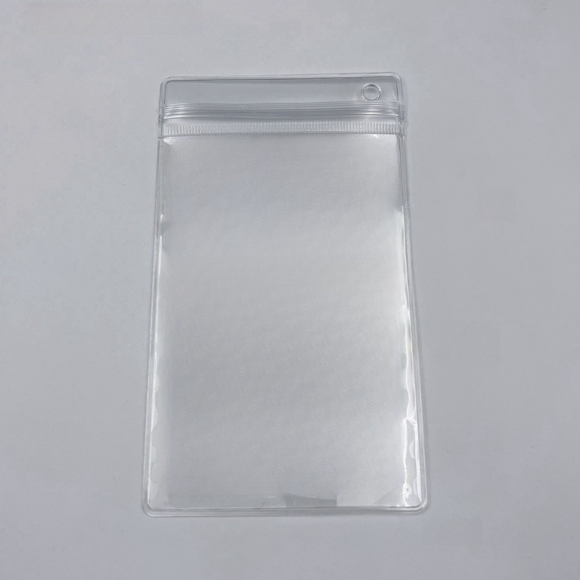 Bolsa de sello transparente de PVC agujero parcial engrosado llave colgante joyería bolsa de sellado de almacenamiento agujero colgante exhibición bolsa de sellado