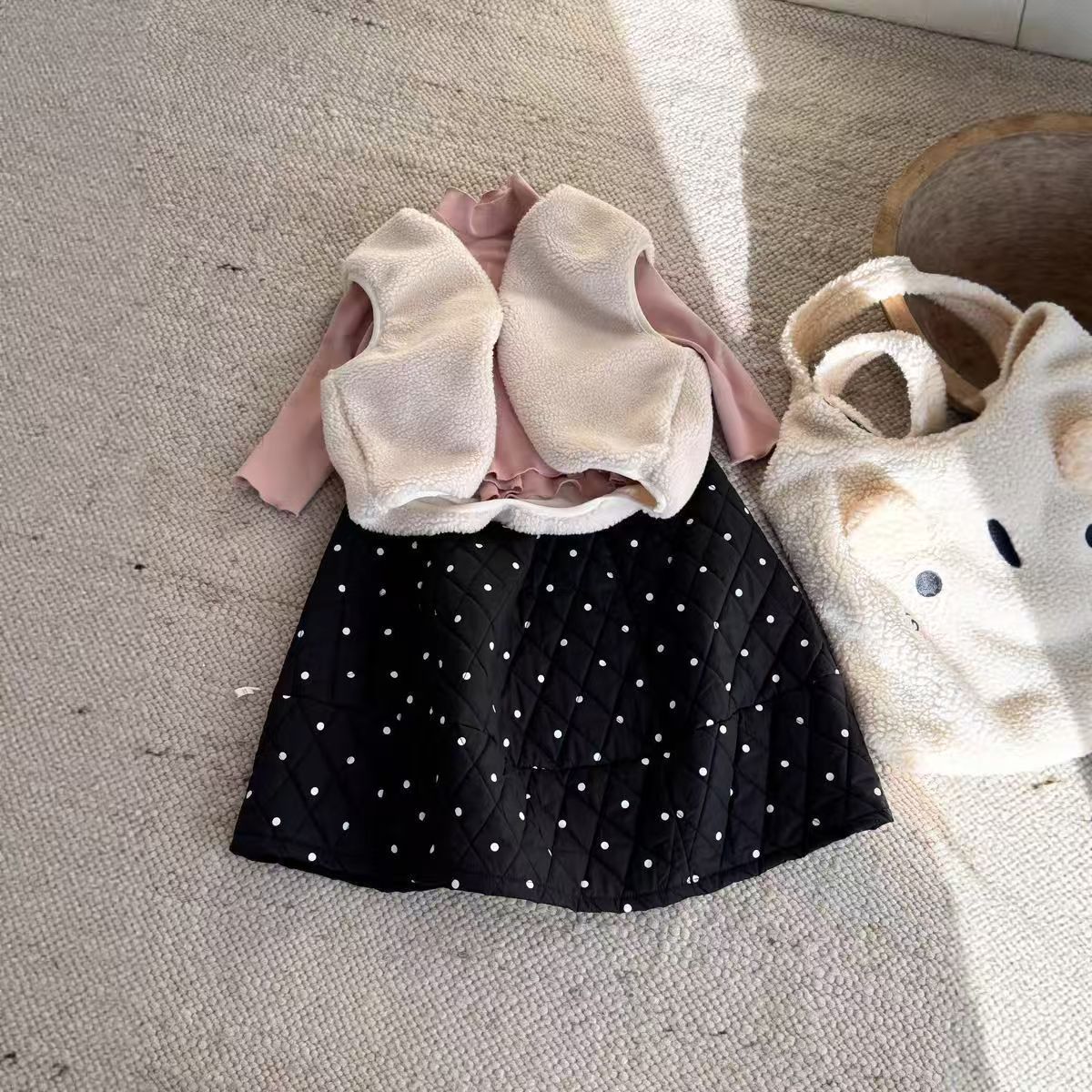 Niñas gruesas y cómodas falda de punto de invierno 2025 nuevos productos coreanos para niños puntos calientes A-shape falda larga de moda