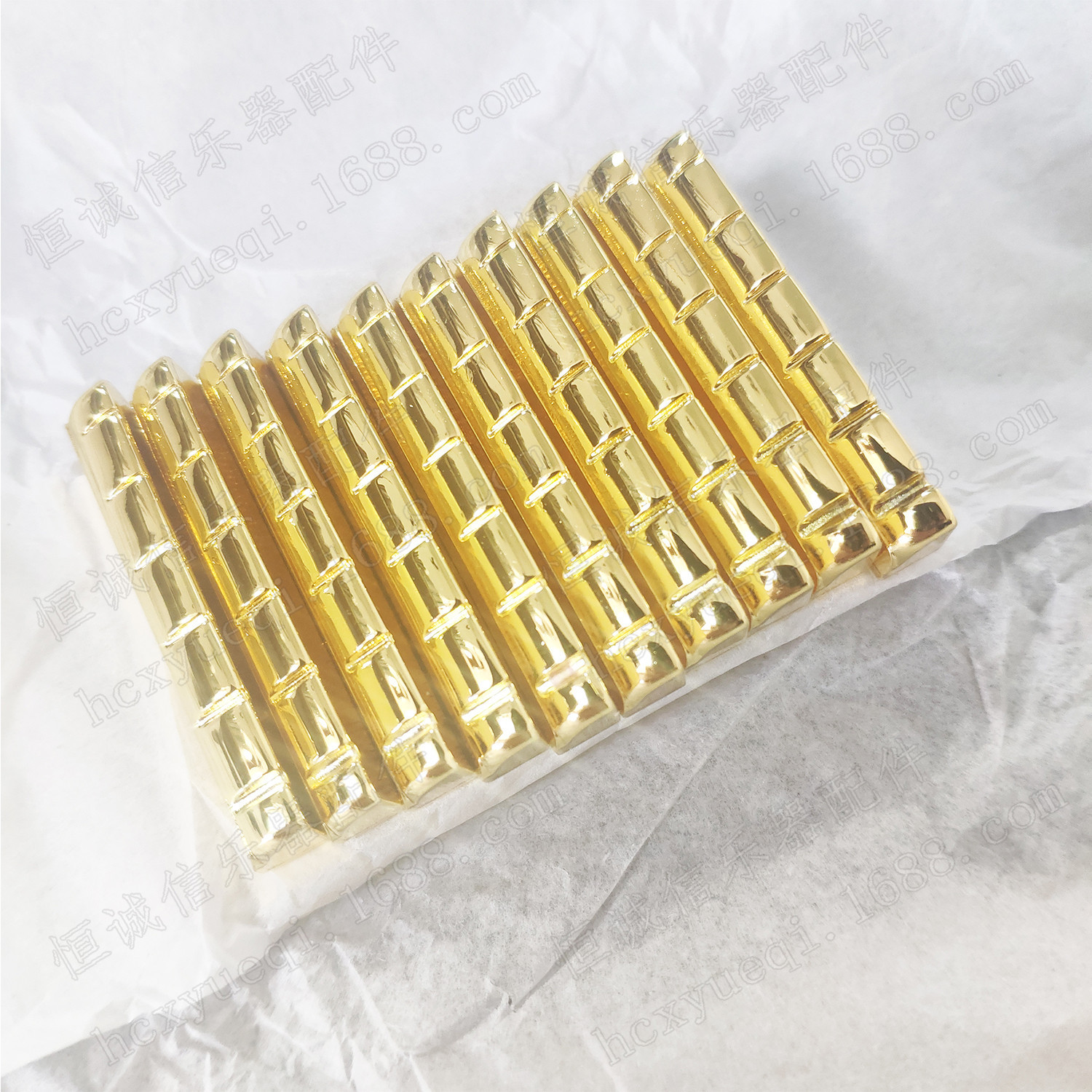 Guitarra superior e inferior traje de almohada de cuerda guitarra popular superior e inferior almohada de cuerda de metal puente de cobre almohada de cadena sólida cadena de cono de cadena de uñas al por mayor