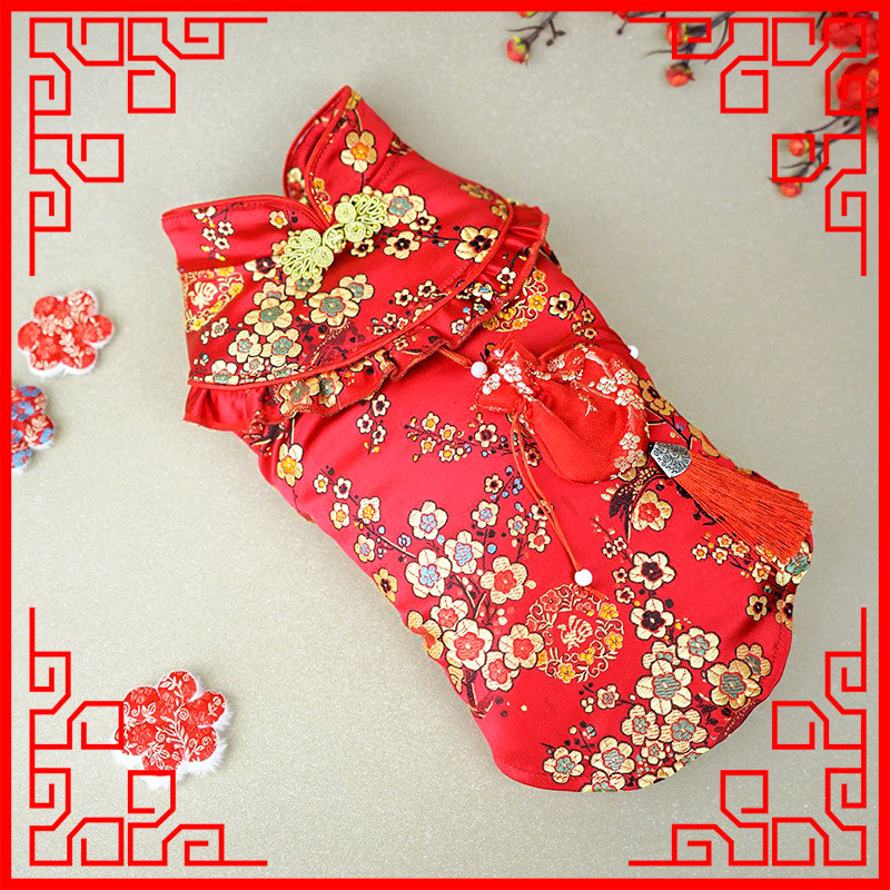 Nueva mascota Año nuevo perro ropa Año Nuevo festivo suerte bolsa Tang traje cheongsam mediano y pequeño perro peluche una generación