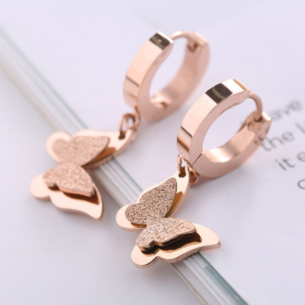 Personalidad de la moda titanio acero mariposa hebilla del oído temperamento femenino pendientes populares oro rosa luz lujo joyería del oído