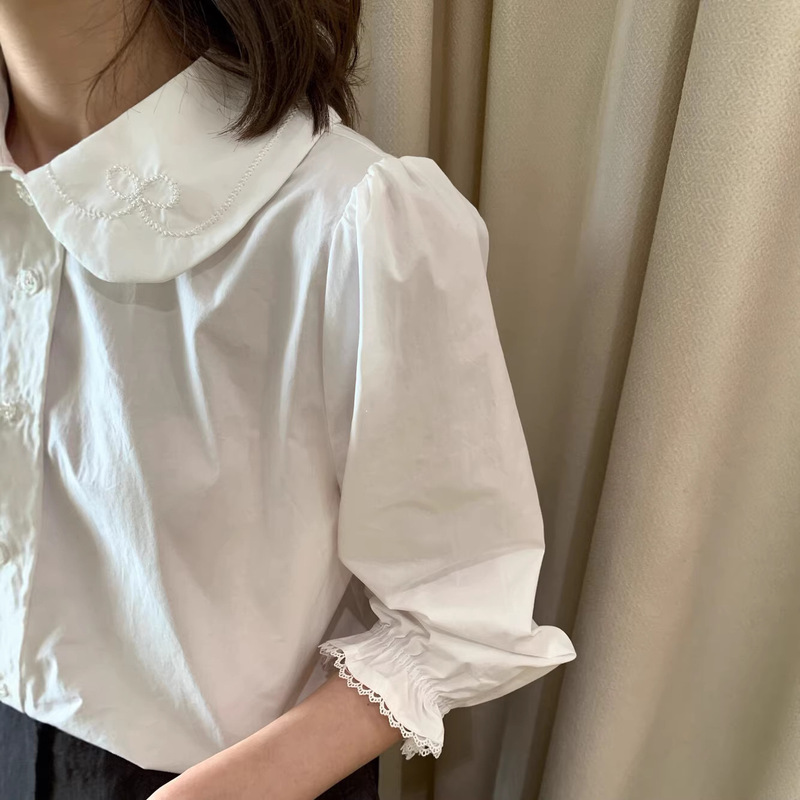 2026 Spring New Korean Style Simple Sweet Doll Collar Embroidered Three-Quarter Sleeve Shirt for Women Versatile Youthful Top 2026 Spring New Korean Style Simple Sweet Doll Collar Embroidered Three-Quarter Sleeve Shirt for Women Versatile Youthful Top
