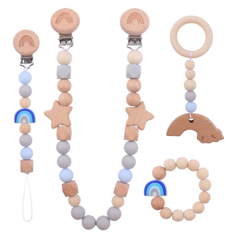 Nuevo bebé suministros dibujos animados silicona Arco Iris mordedor calmante bebé chupete cadena coche colgando mordedor conjunto de cuatro piezas