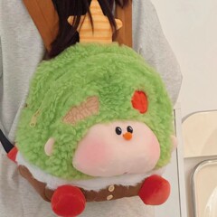 リンゴの木のリュックサックの女性の日本の香港風のベルベットのリュックサックの女性の漫画は少女の心のかばんの人形の漫画を包んで潮を包みます。