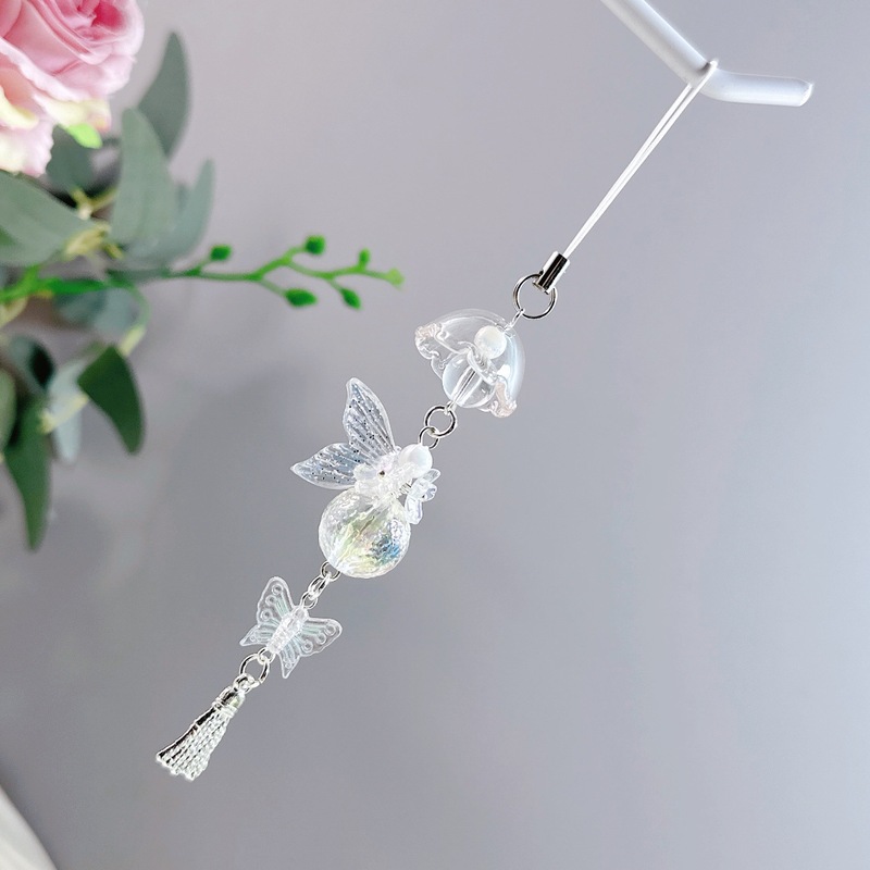 新商品の桜の魚の尾のレーザーはまぶしい色の風鈴の少女を発射します。|undefined