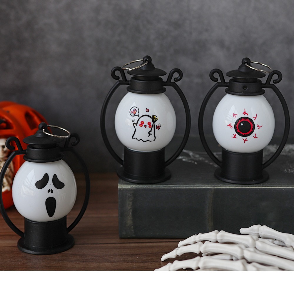 Linternas de calabaza portátiles de Halloween, nuevos accesorios de diseño de atmósfera transfronteriza, decoración de lámparas de aceite pequeñas, linternas nocturnas, linternas
