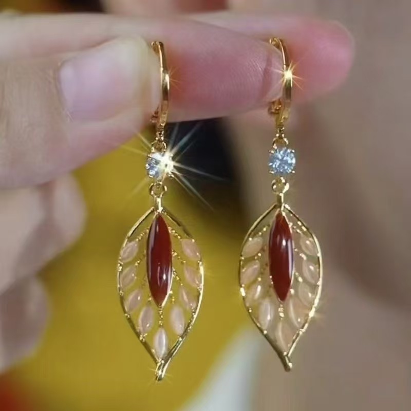 Red earrings, cat's eye