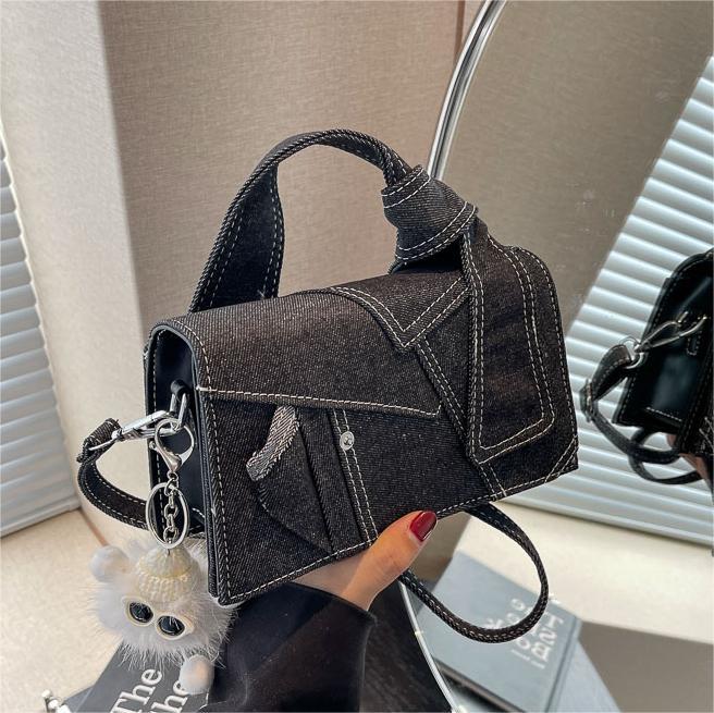Nicho de diseño bolso denim damas primavera y verano 2024 nuevo simple empalme bolso pequeño bolso de alta calidad