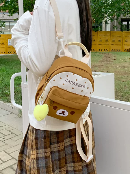 Cute cartoon color-blocked small backpack with polka dot print, designed for girls, perfect for everyday outings, simple and casual style