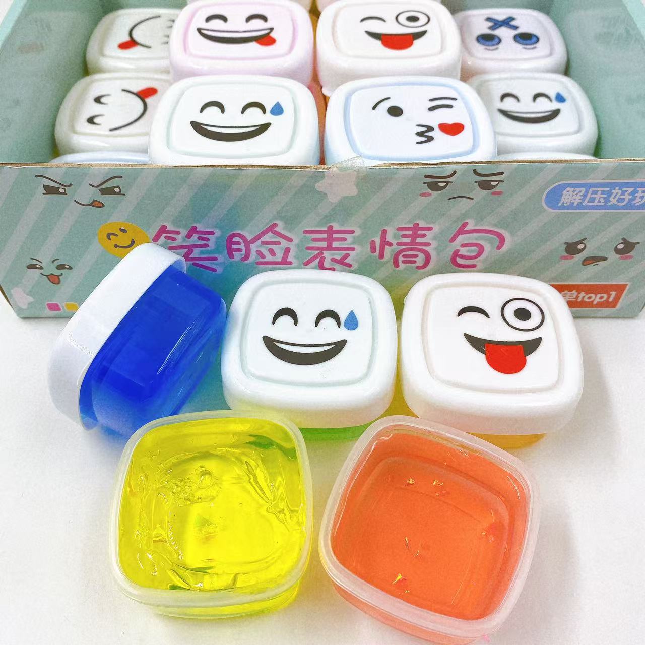 Nuevo paquete de emoticonos de cara sonriente de 24 entrada, pegamento espumoso, lodo de color slime, pegamento M, arcilla de cristal, juguetes para niños de bricolaje al por mayor