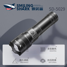 White laser light LED flashlight charging the mobile phone