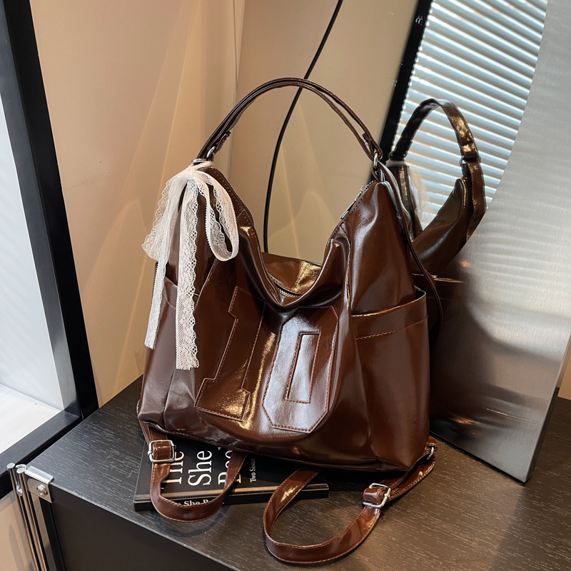 2024 nuevo bolso de plata de gran capacidad de ocio de mujer Semmeng mochila de hombro mochila de viaje bolsa de cubo