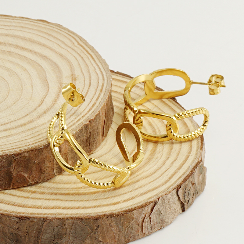 Nuevo europeo y americano transfronterizo de acero inoxidable galvanizado 18K pendientes anillo hebilla retro pendientes de diseño geométrico al por mayor