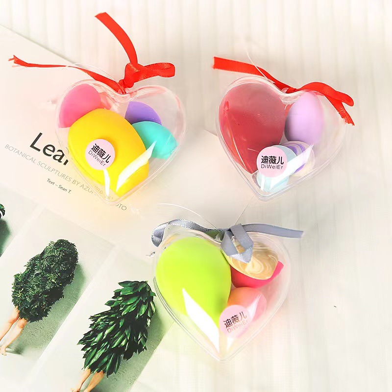 El amor de los huevos de maquillaje no comer polvo, polvo seco y húmedo, maquillaje con un pequeño conjunto de polvo de maquillaje de huevos de color al por mayor.