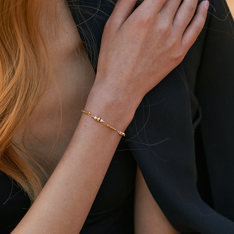 E-commerce supply independent station brass plated 18K real gold pearl bracelet elegant designer high-grade simple bracelet