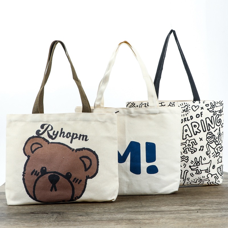 现货帆布袋logo图案定 制可爱卡通手提袋时尚办公包