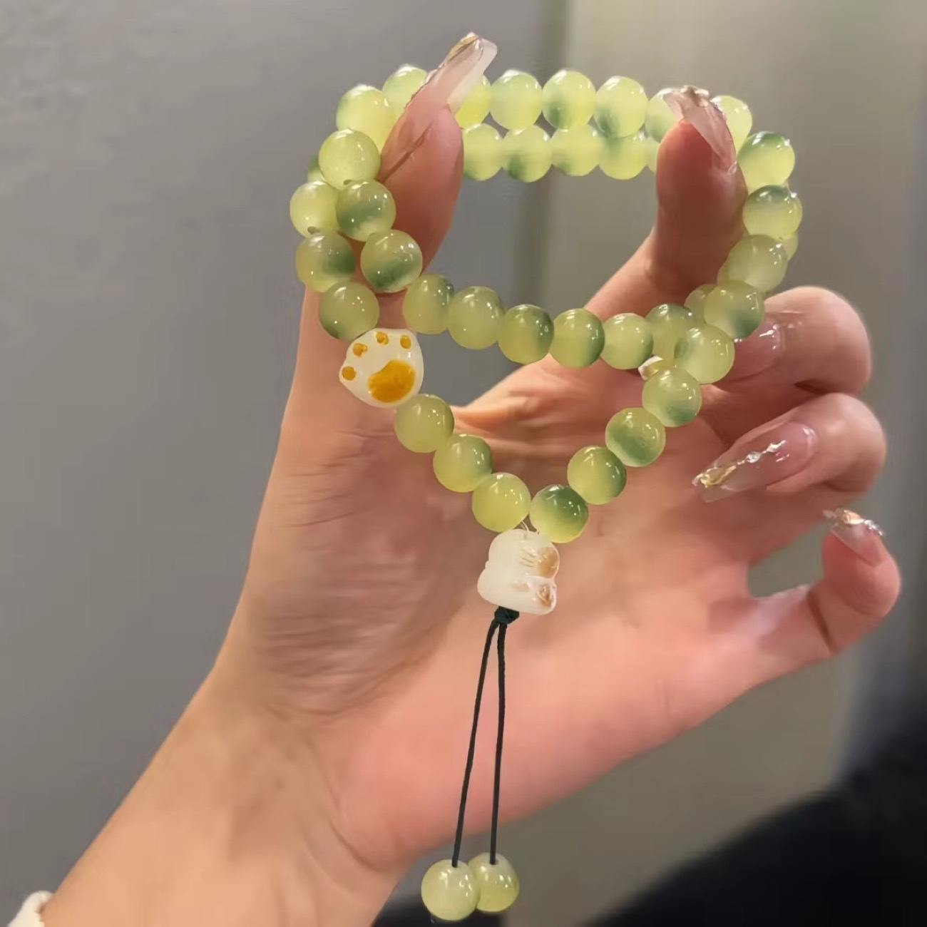 Cute garra de gato Bodhi doble anillo pulsera estudiantes alrededor de los dedos suave para jugar pulsera dulce de alto valor facial pareja regalo de amiga