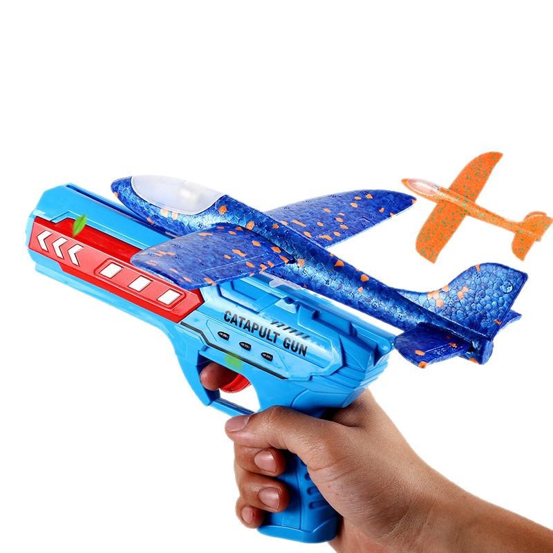 Transfronterizos catapultar ametralladoras aviones juguetes para niños explosiones de espuma luz aviones lanzadores de pistolas al por mayor