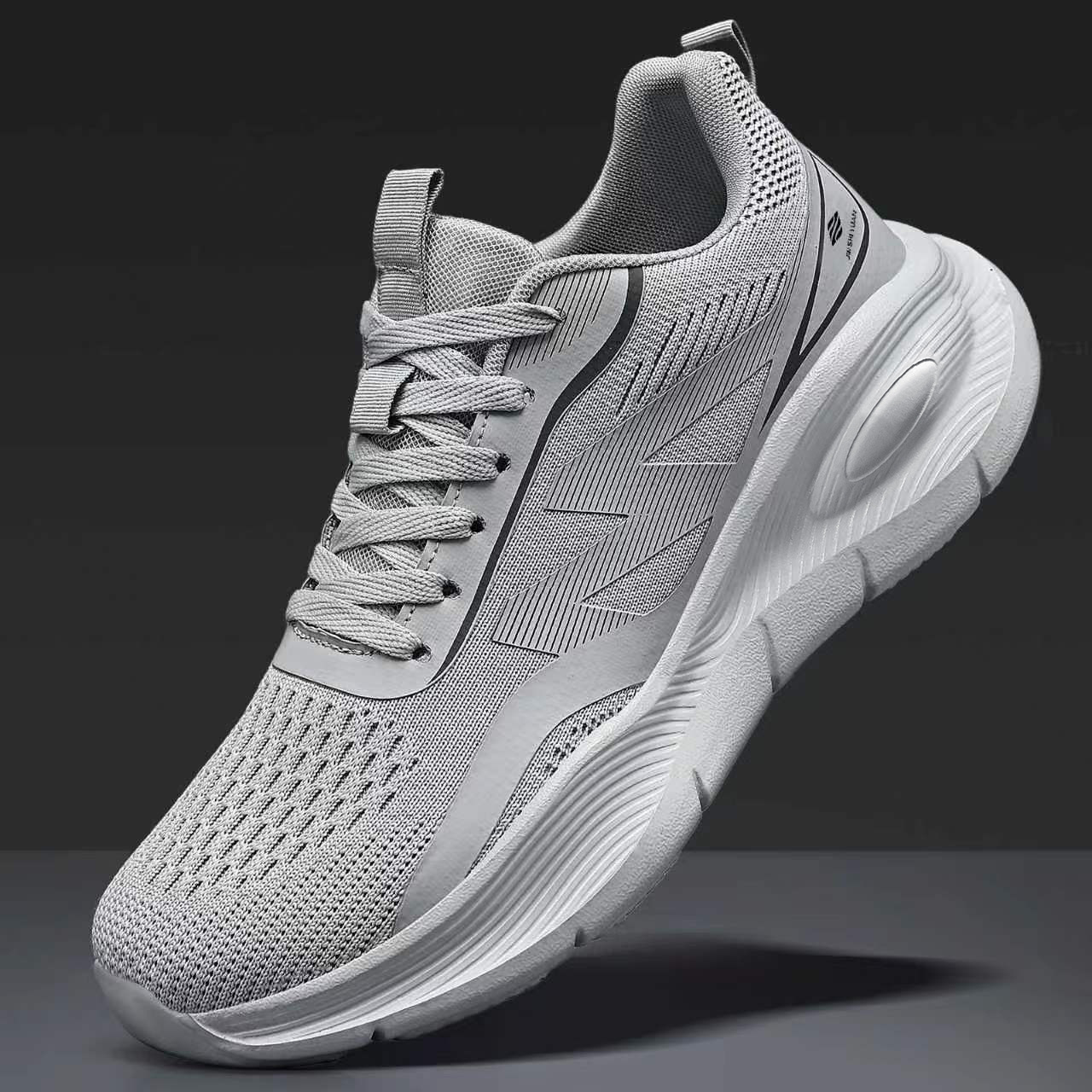 Zapatos de primavera para hombres zapatos deportivos ligeros para hombres zapatos casuales de color sólido en stock al por mayor zapatos de correr transpirables zapatos de red