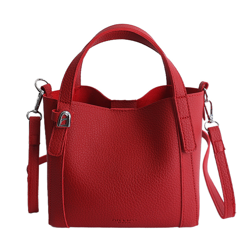Nicho coreano litchi pattern bolso de cubo de mano mujer comercio exterior nueva moda alta textura ligera lujosa bolsa de mochila